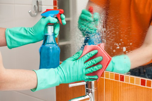 Local cleaners working in a Notting Hill period property hallway
