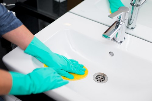A cleaner maintaining a commercial workspace in Nottinghill